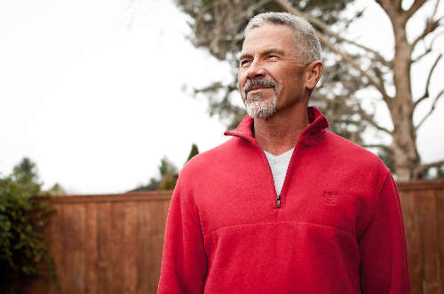 Michael G in a red sweater