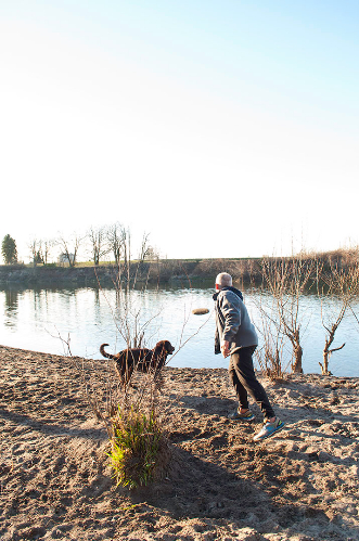 Michael G with his dog Rufus at the river